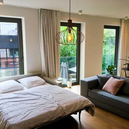 Апартаменты Modern In The Heart Of