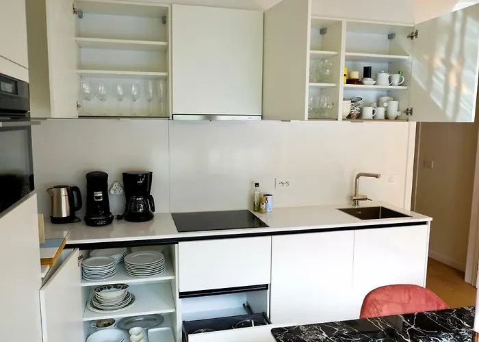 Апартаменты Modern In The Heart Of